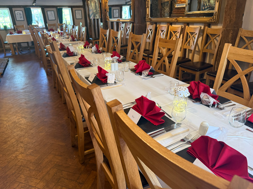 Wedding reception dining room at The Hole in the Wall, Cambridge